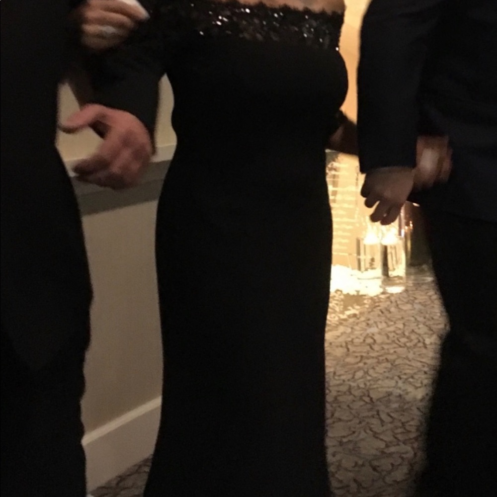 Black formal dress. Mother of the groom.